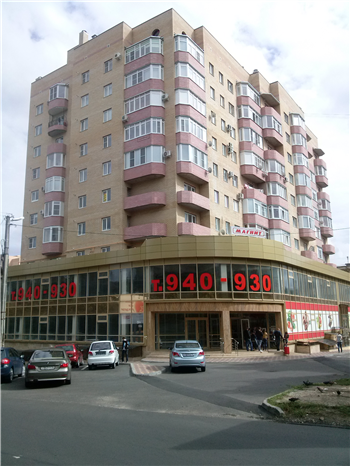 Жилой дом со встроенно-пристроенными помещениями и подземным паркингом по ул. Ленина, 264 